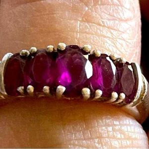 925 silver ring with beautiful purple stones.